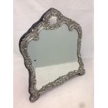 An Edwardian silver mounted dressing table mirror, hallmarked Birmingham 1903,