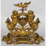 A 19th century gilt bronze watch stand The vacant aperture surmounted with a ho-ho bird flanked by