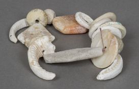 A bracelet formed from various fossil fragments and shells,