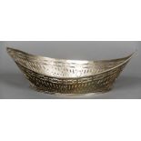 A Dutch silver centre bowl Of navette form with pierced and engraved decorations,