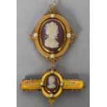 An unmarked gold carved cameo set and seed pearl mounted brooch Of oval form,