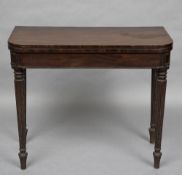 A 19th century mahogany card table,