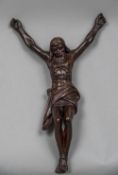 A 19th century Continental carved wood figure of Christ on the cross Typically worked.