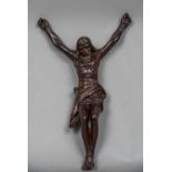 A 19th century Continental carved wood figure of Christ on the cross Typically worked.