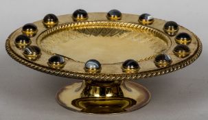 A Victorian gilt metal agate set tazza With engraved decoration. 30.5 cm diameter.