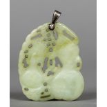 A Chinese carved jade pendant Pierced and carved as two gourds with unmarked silver suspension loop.