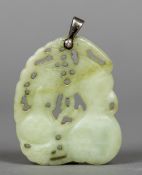 A Chinese carved jade pendant Pierced and carved as two gourds with unmarked silver suspension loop.