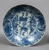 A 16th century Chinese blue and white porcelain dish Centrally painted with ships within floral