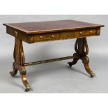 An early 19th century ormolu mounted brass inlaid mahogany library table The gilt tooled leather