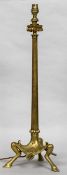 A late 19th/early 20th century gilt bronze and brass columnar table lamp The tripartite base with