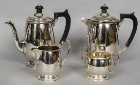 A silver four piece tea service, hallmarked Sheffield 1934 and 1942,