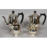 A silver four piece tea service, hallmarked Sheffield 1934 and 1942,