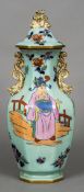 A 19th century ironstone vase and cover Decorated in the chinoiserie manner with twin pierced