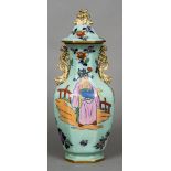 A 19th century ironstone vase and cover Decorated in the chinoiserie manner with twin pierced