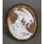 A 19th century unmarked gold mounted cameo brooch Carved with a classical maiden feeding an eagle.