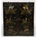 An 18th century chinoiserie lacquered hanging cabinet Of slender form with twin doors,