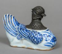 A Chinese blue and white Ming porcelain and white metal (probably silver) water dropper Modelled as