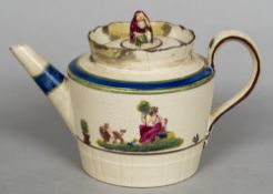 An early 19th century creamware teapot Moulded with classical figures and with figural finial. 12.