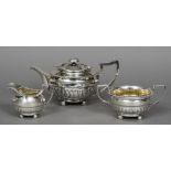 A matched George III Scottish silver tea set, hallmarked Edinburgh 1813,