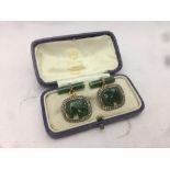 A pair of Russian gold diamond set jade mounted cufflinks, with 56 Zolotnik mark,