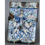 A 19th century Qajar tile Finely painted and relief moulded with a warrior astride an ox;