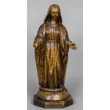 An 18th century carved wooden model of the Madonna Typically modelled, standing in flowing robes,