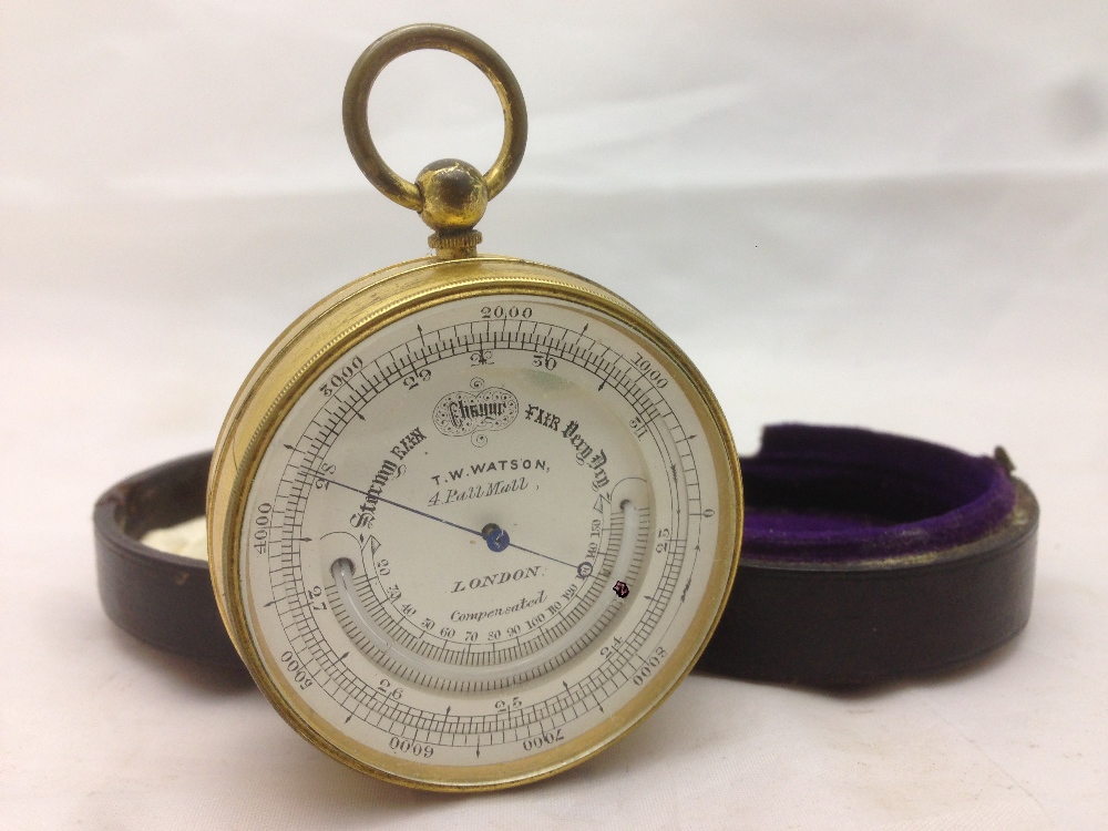 A 19th century gilt metal cased pocket barometer and thermometer by T W Watson, Pall Mall,
