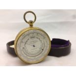 A 19th century gilt metal cased pocket barometer and thermometer by T W Watson, Pall Mall,