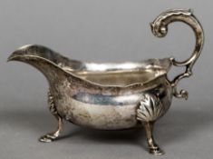 A Georgian silver sauceboat, possibly hallmarked for London 1763,