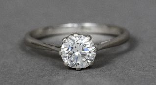 A white gold diamond solitaire ring The claw set stone spreading to just under 1 carat.