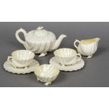 A second period Belleek Neptune tea set for two Comprising: teapot and cover, cream jug,