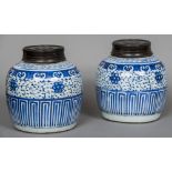 A pair of 19th century Chinese blue and white ginger jars Each mounted with a removable turned