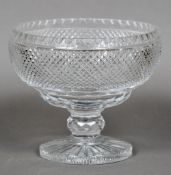 An Irish cut crystal bowl With hobnail cut decorations, standing on a spreading foot.