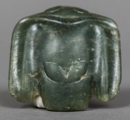 A Chinese Hongshan carved green jade pendant Worked as a stylised bird. 5 cm wide.
