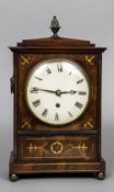 A Regency brass inlaid mahogany cased bracket clock The white painted dial with Roman numerals,