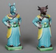 Two Chinese pottery zodiac figures Each modelled standing, one with a bulls head,