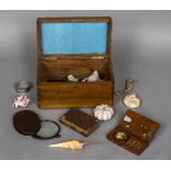 A collection of various shells and fossils and related items Housed in a 19th century walnut box,