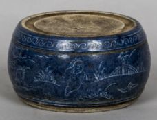 A Chinese porcelain ink stone With incised decoration on a blue ground. 8.5 cm high.
