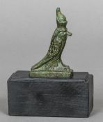 A patinated cast bronze model formed as the Egyptian Horus falcon Typically cast wearing the double