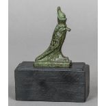 A patinated cast bronze model formed as the Egyptian Horus falcon Typically cast wearing the double