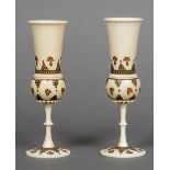 A pair of late 19th/early 20th century Eastern ivory stem vases Each of turned form with dot and