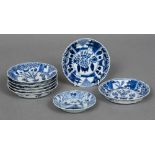 A set of seven small 18th century Chinese blue and white dishes Each decorated with vignettes of