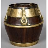 A 19th century brass mounted wooden pail, possibly yewwood With iron and brass coopering.