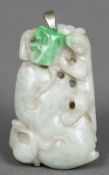 A Chinese carved jadeite pendant Worked with a salamander. 6 cm long.