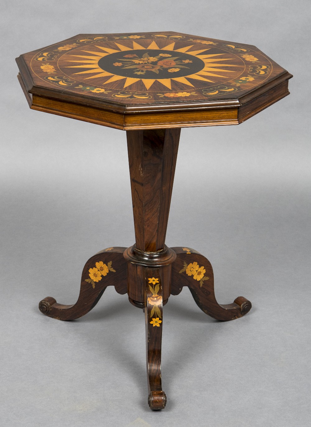 A 19th century marquetry inlaid rosewood tilt top tripod table The folding octagonal top with