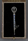 A French platinum diamond and sapphire set pin brooch The top section set as a flower. 8 cm long.