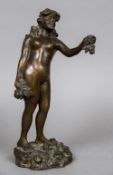 A 19th century bronze figurine Modelled as a nude girl holding a flower,