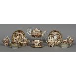 A 19th century Crown Derby ten setting tea service Decorated in the Imari palette,