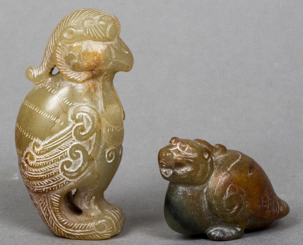 Two small jade carvings Each of mythical bird like beasts. The largest 6 cm high.