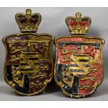 A pair of 19th century papier mache heraldic crests Each surmounted with a crown. Each 99 cm high.